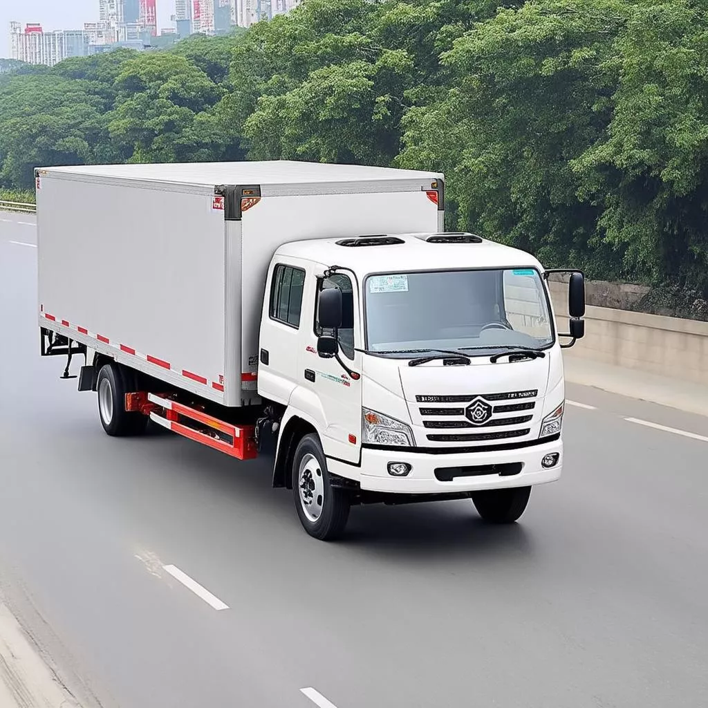 Hình ảnh một chiếc xe tải Dongfeng đang di chuyển trên đường