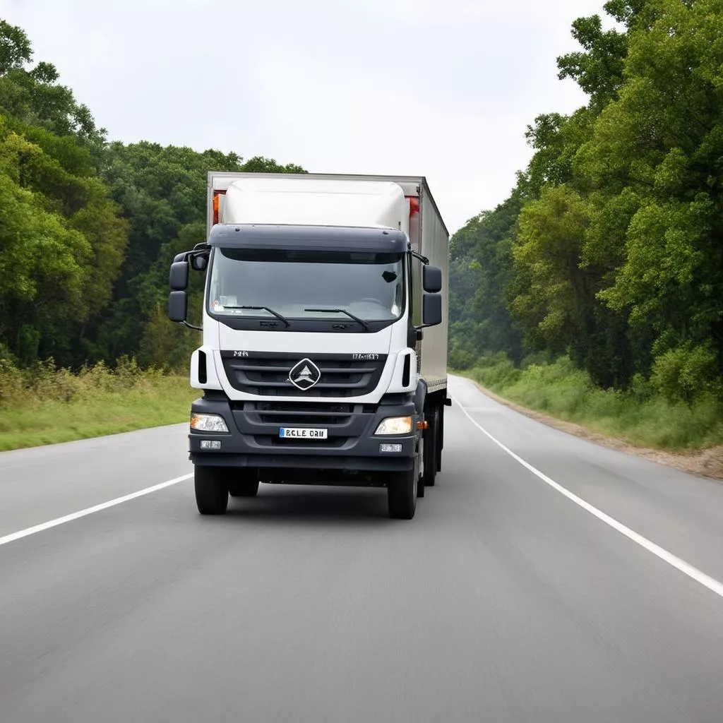 Hình ảnh một chiếc xe tải đang chạy trên đường