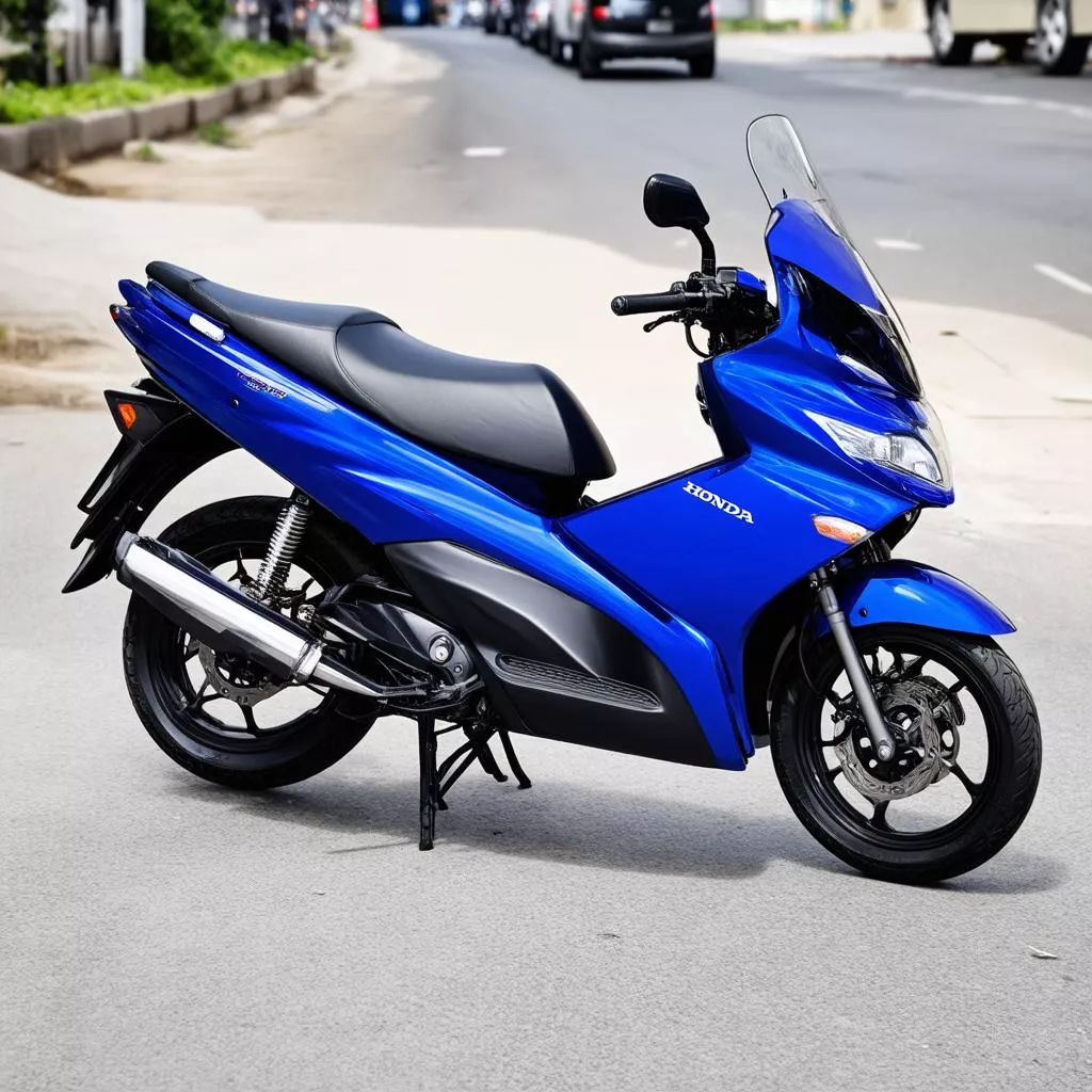 Blue Honda Vision Scooter