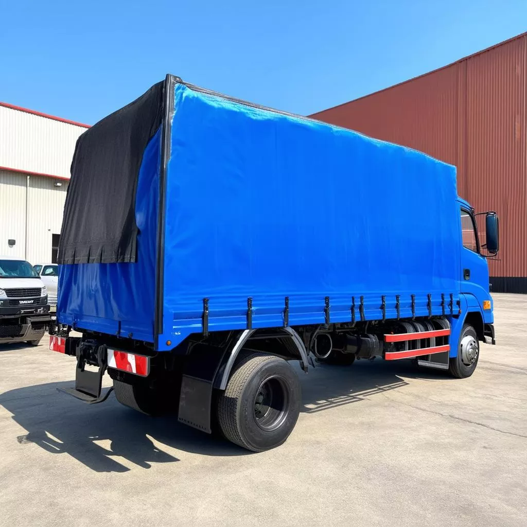 Blue Isuzu QKR 270 Canvas Top Truck