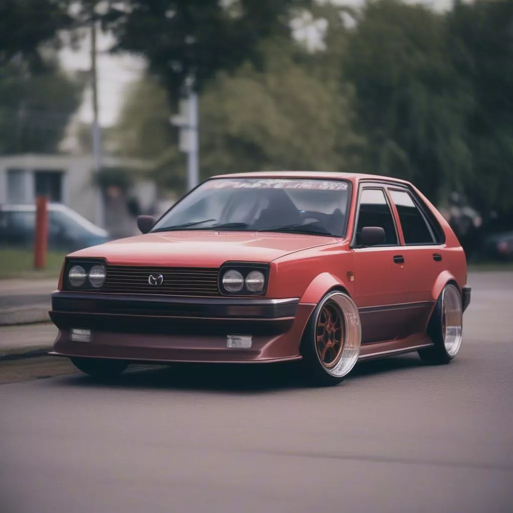 Mazda 323 cũ được độ lại