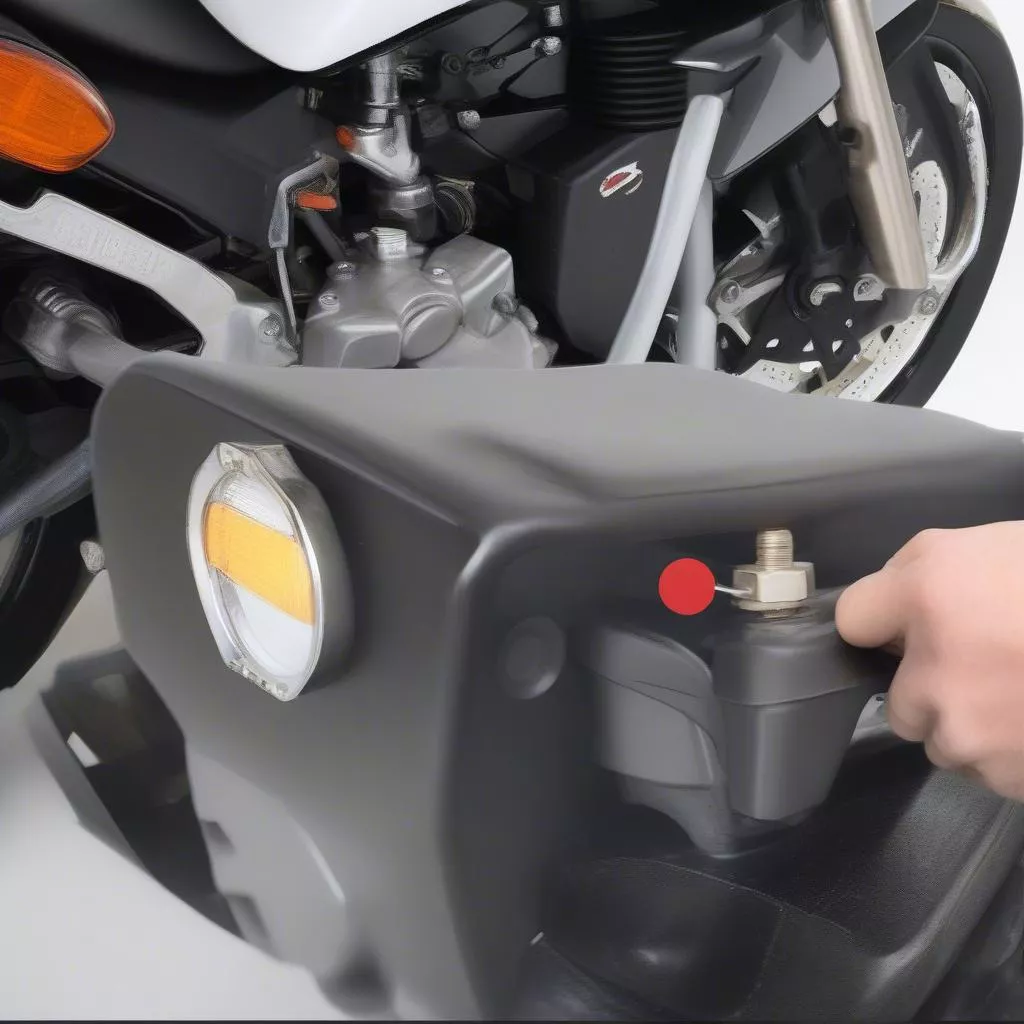 Kennzeichenbeleuchtung am Honda Wave demontieren: Anleitung