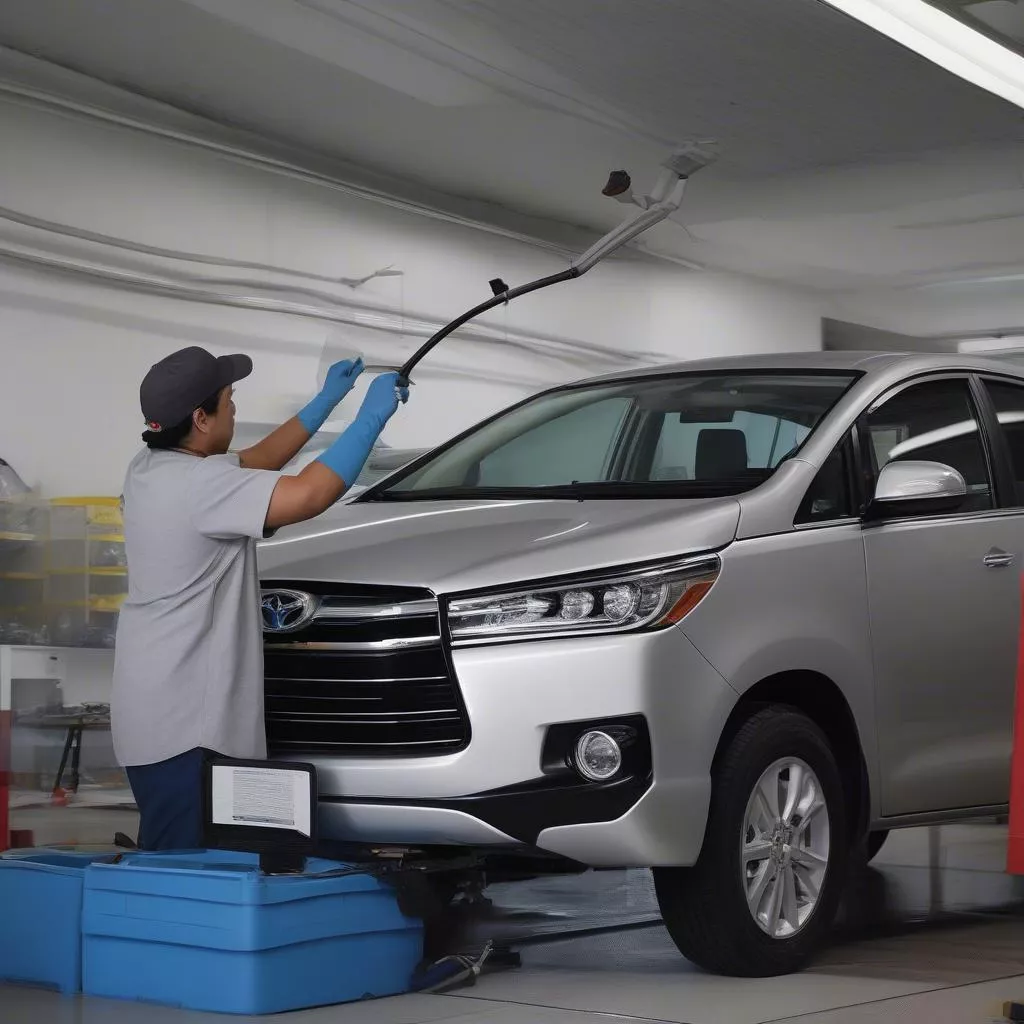 Thay kính chắn gió Innova